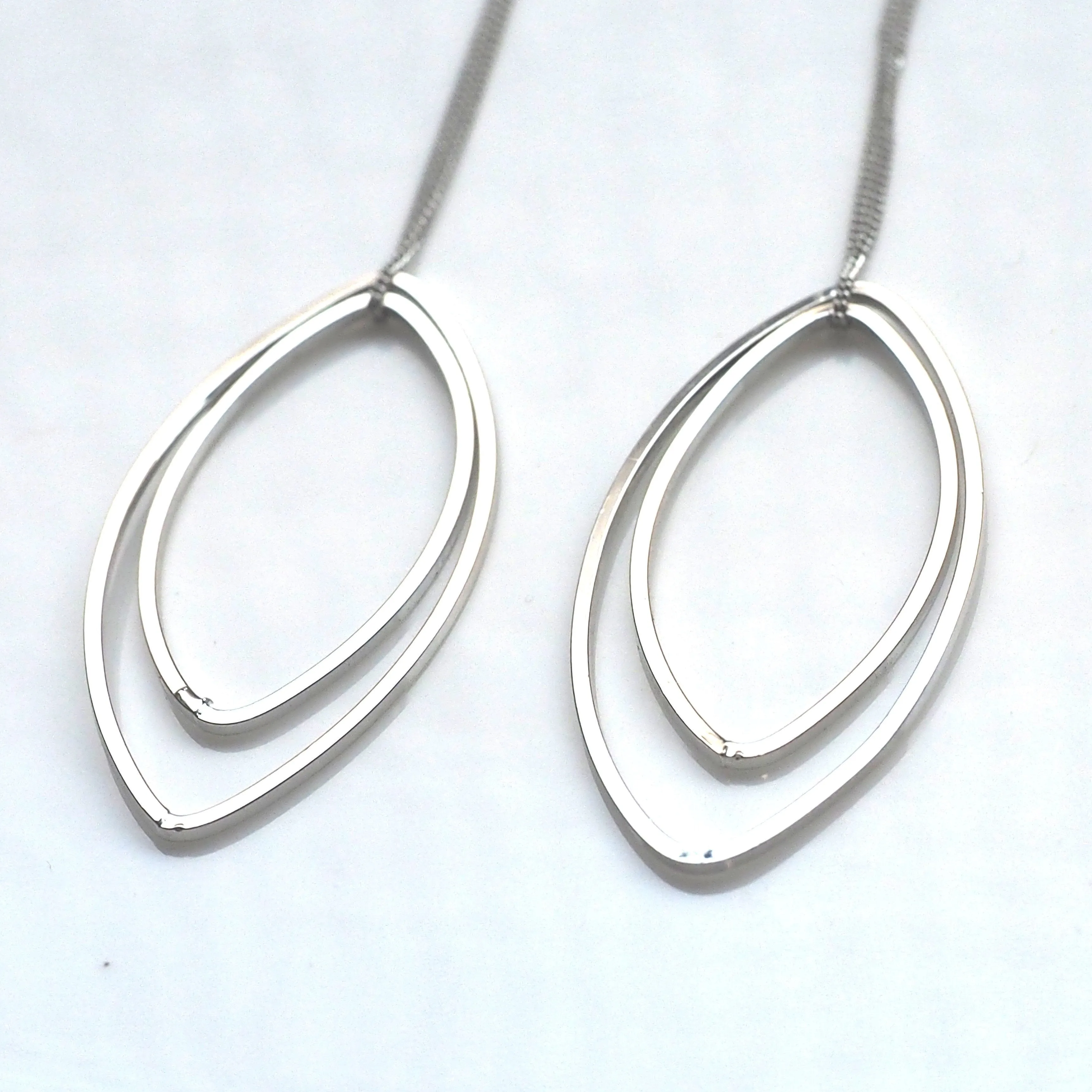 Dangle silver double oval hoop invisible clip on earrings