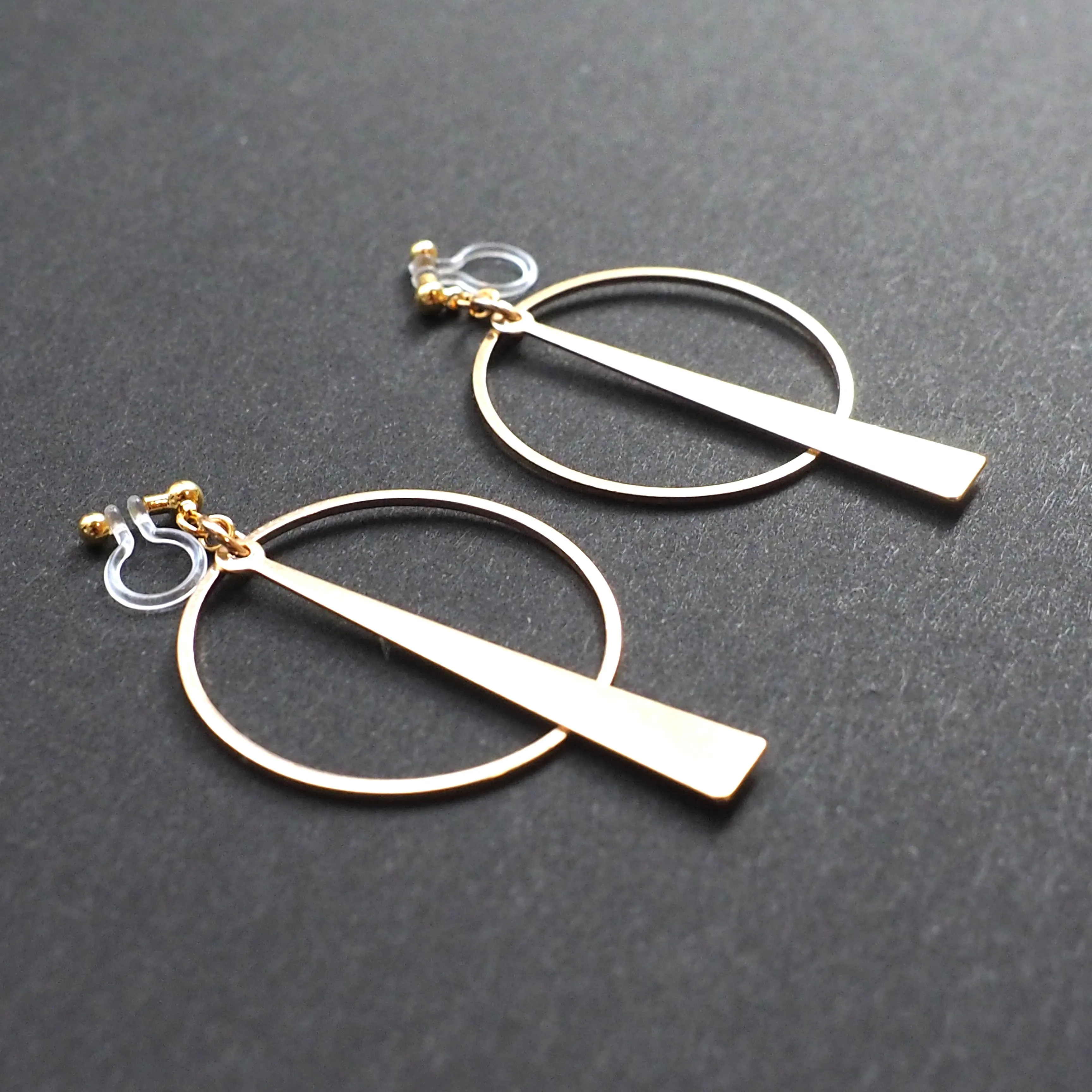 Geometric gold hoop invisible clip on earrings