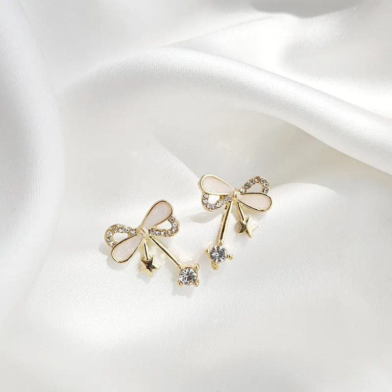 Ribbon Shaped Beige Crystal Rhinestone Bow Tie Invisible Clip On Stud Earrings