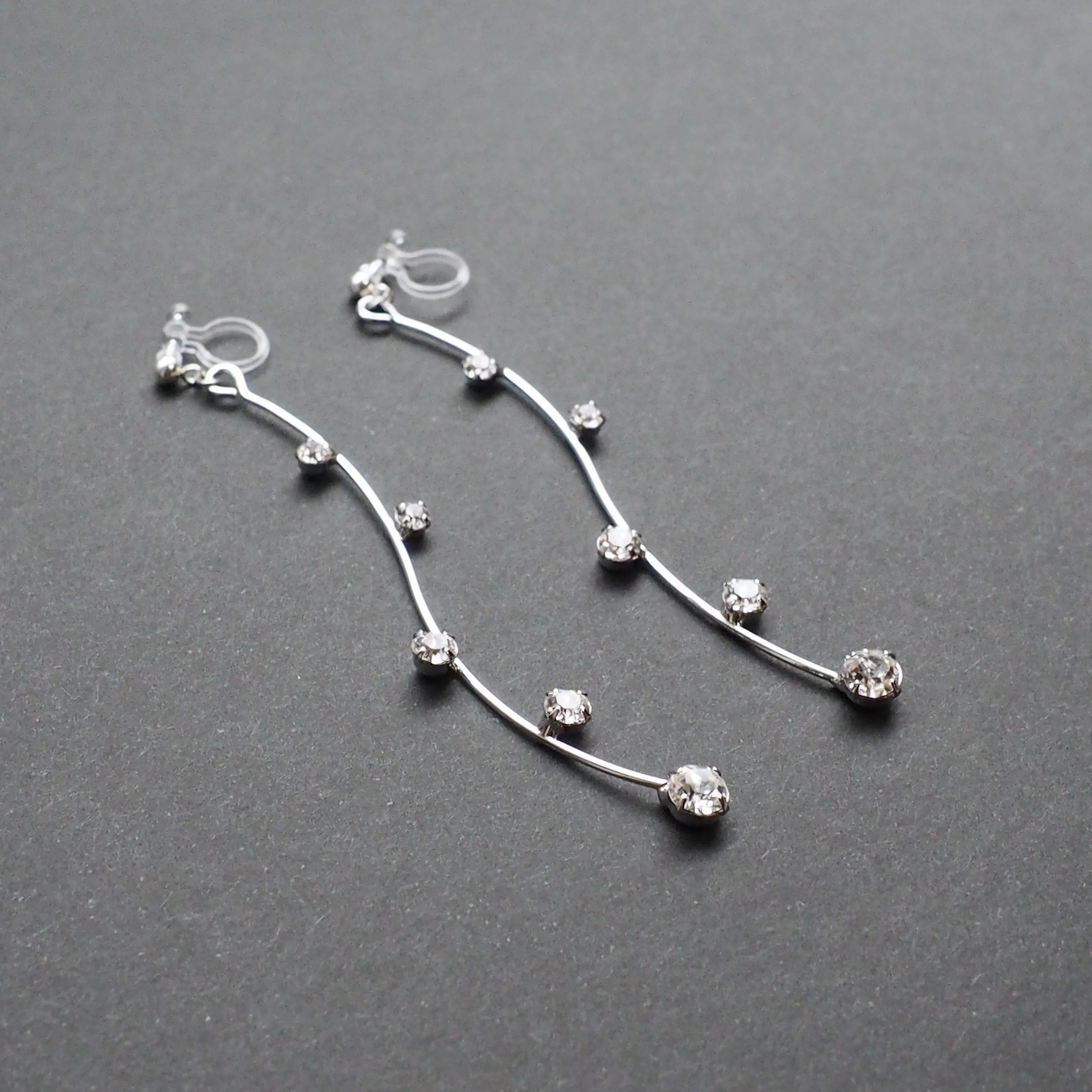 Silver waved bar rhinestone crystal dangle invisible clip on earrings