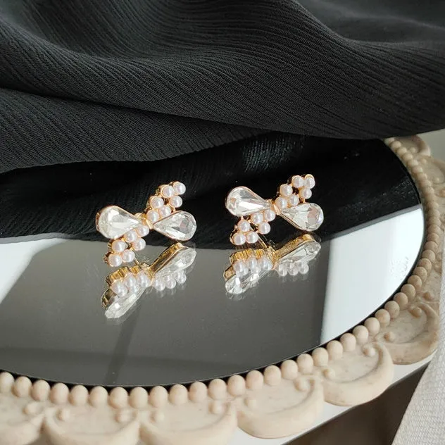 White Pearl Ribbon Bow Tie Crystal Rhinestone Invisible Clip On Earrings